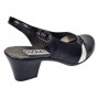Pantofi eleganți de damă, tip slingback, cu toc gros stabil și design modern în combinație negru-alb. Ideali pentru ținute office sau casual.